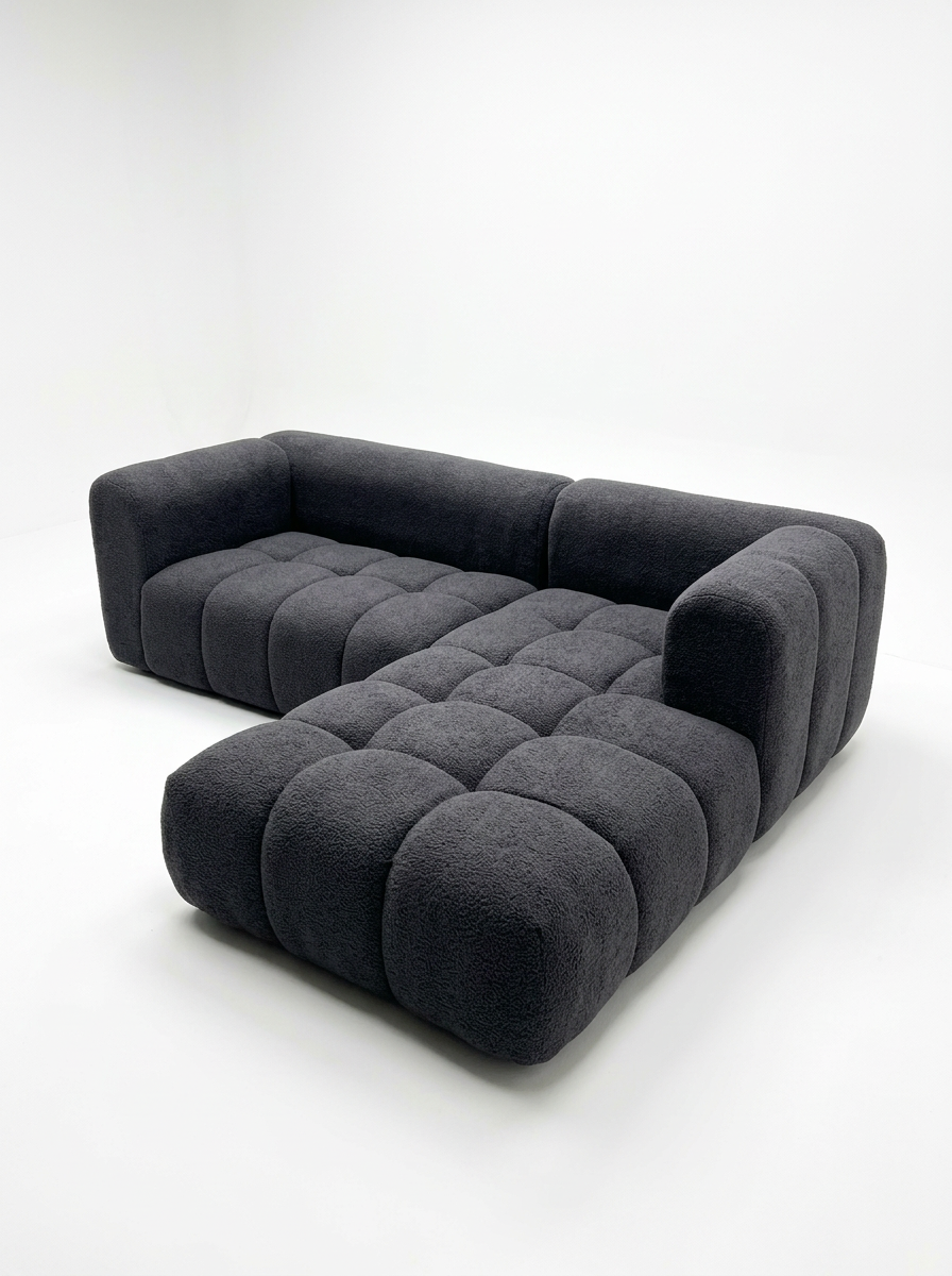 Charcoal bouclé puffy modular sectional with deep tufting