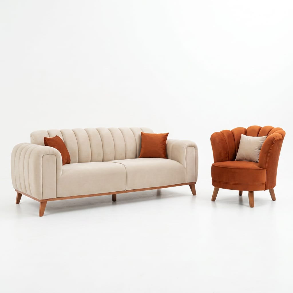 Ivory channel-tufted 3-seater sofa paired with a rust orange petal accent chair