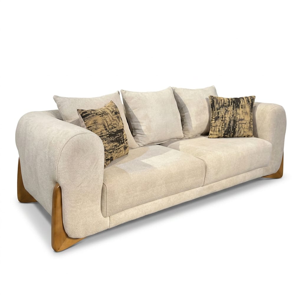 Cream curved sofa with rounded arms set on sculptural arched wood base