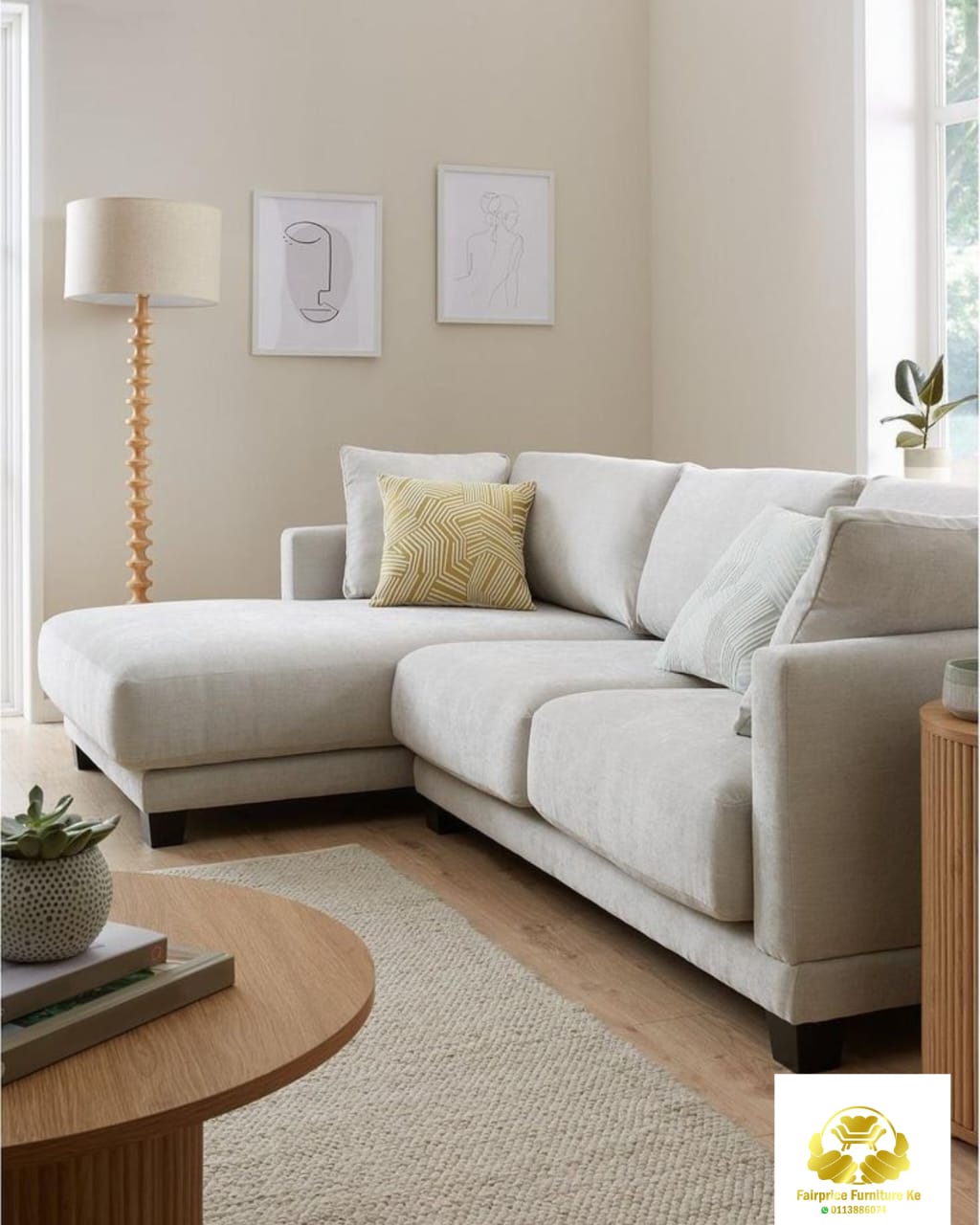 Soft beige feather-fill L-shape sectional with left chaise styled in a sunlit living room